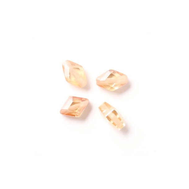 Zirconia, diamonds, light brown, 7 x 5mm.