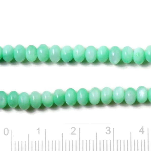 Shell beads, full strand, rondelle bead, dyed lush light green, 5x3 mm, 105 pcs