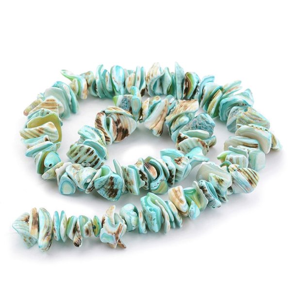 Mother-of-pearl. whole strand. Coloured, uneven. Blue/brown. ca. 110 pcs. 10-20x8-12x3mm