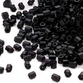 Delica, size #11, black hexagonal glass bead, opaque, 1.1x1.7mm, 5.2 grams.