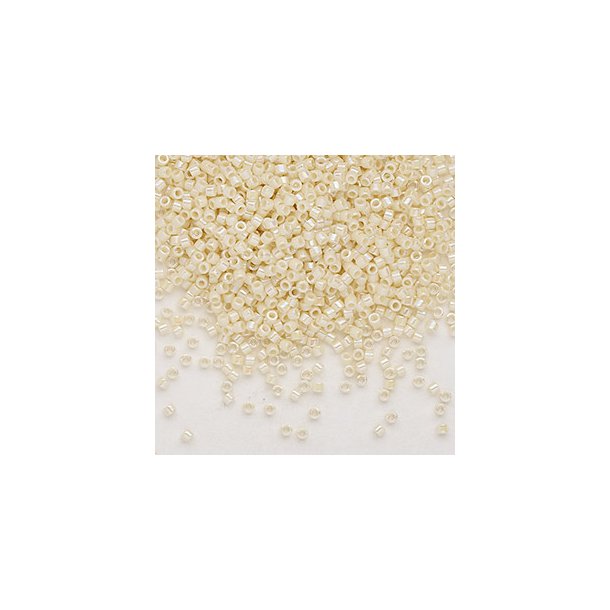 Delica, size #11, cream white glass bead, opaque, alternating, 1,1x1,7mm, 5,2 g
