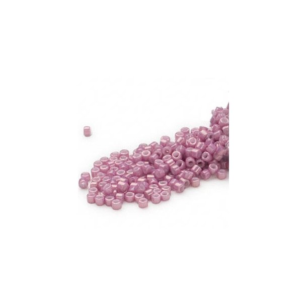 Delica, size #11, rose luster glass bead, opaque, 1.1x1.7mm, 5.2 grams.