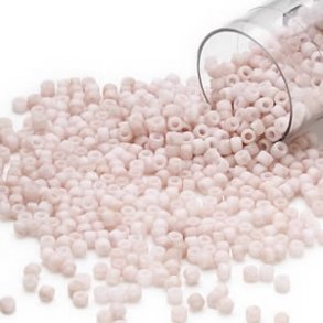 Delica, size #11, matte light tan, 1.1x1.7mm, 5.2 grams.