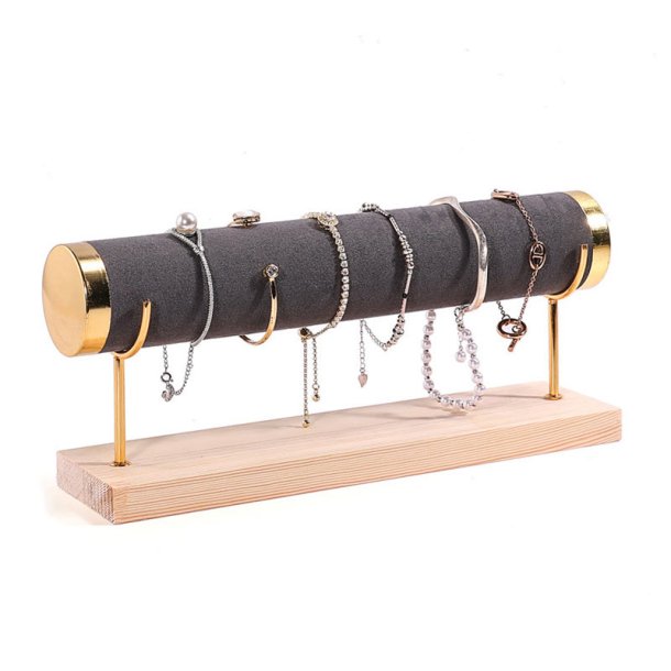 Bracelet stand in grey faux leather, golden metal and wood, with 1 roll, 29x7x12,5 mm