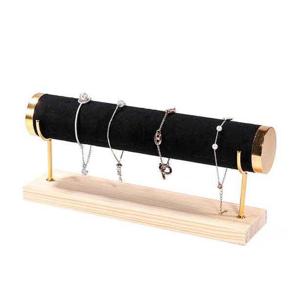 Bracelet stand in black faux leather, golden metal and wood, with 1 roll, 29x7x12,5 mm