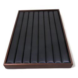 Schaukasten, fr Fingerringe etc. mit Rillen, schwarzer Stoff und kupferfarben. 1 Stck