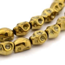 Hematite, ganzer Strang, antik goldener Totenkopf, 10x8x7,5 mm, ca. 40 Stk.