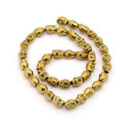 Hematite, ganzer Strang, antik goldener Totenkopf, 10x8x7,5 mm, ca. 40 Stk.