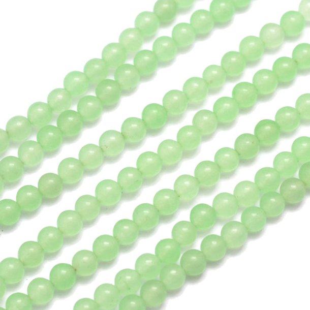 Jade bead, dyed, light jade green, transparent, round, 6mm, 10pcs.
