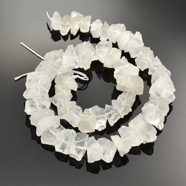 Mountain quartz, whole strand, rough nuggets, white, 12-16x6-12 mm, approx. 25 pcs