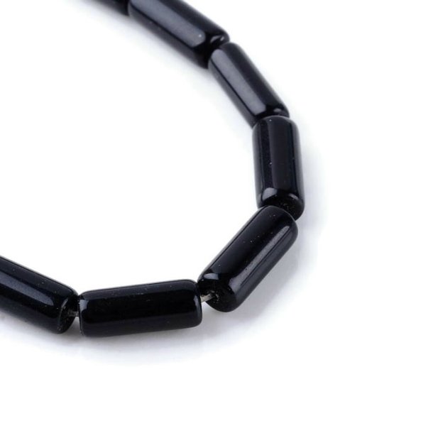 Obsidian tube bead, whole strand, 15x6 mm, 4 pieces.