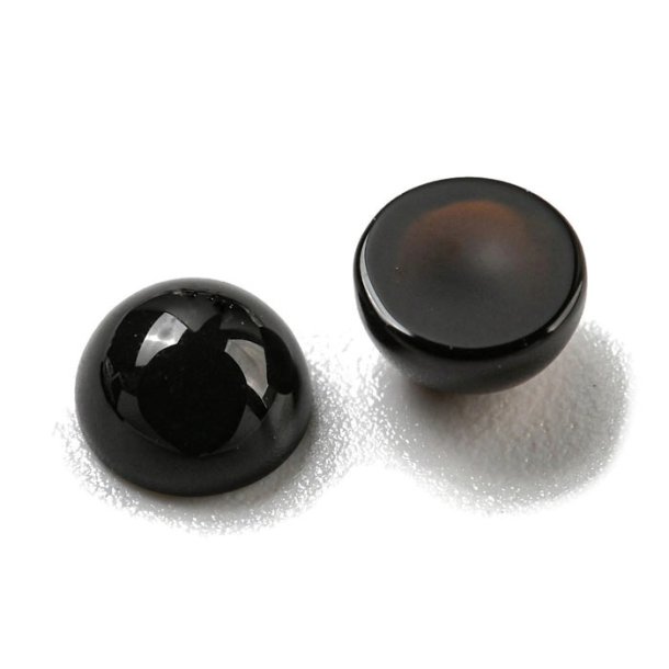Black onyx cabochon (flat back), black, dyed, round, 4x2.5 mm, 2 pcs.