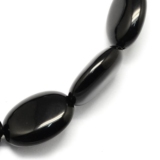 Onyx bead, flat oval, black, 18x13x6 mm, 4 pcs
