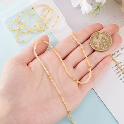 Gelber Opal, ganzer Perlenstrang, rund, facettiert, 2 mm, ca. 190 Stk.