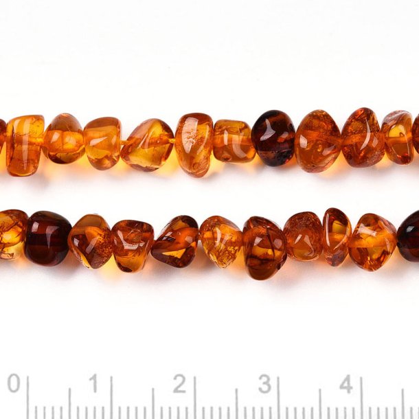 Amber, mix, small golden brownish nuggets, 4,5x6mm, 10pcs
