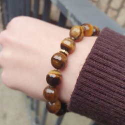 Tiger's eye, full strand, large facetted, round, golden brown. 10mm, 38pcs.