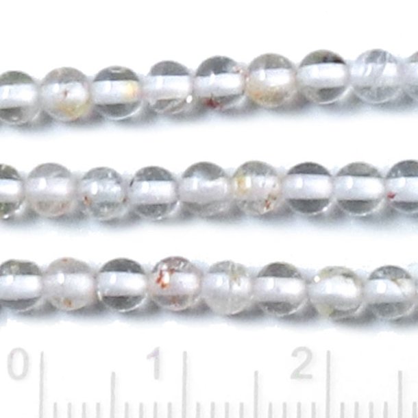 Clear topaz, full strand, round, light pale yellowish, approx. 4 mm, appx. 110 pcs
