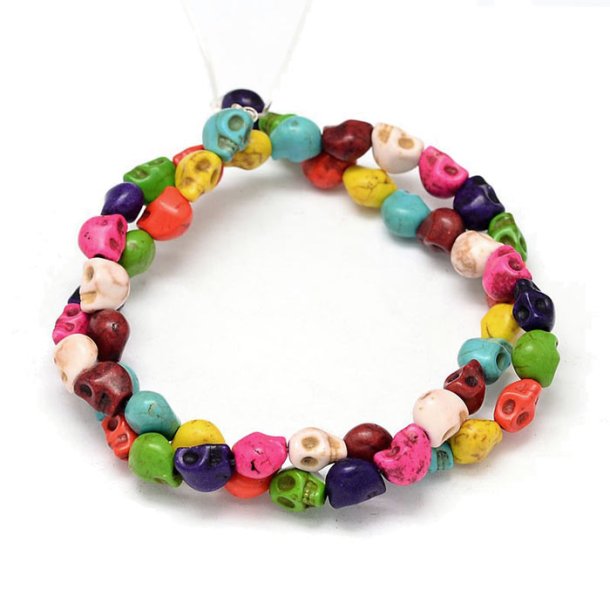 Pressed turquoise, full strand, mix color skulls, 10x8x9mm, 38pcs.