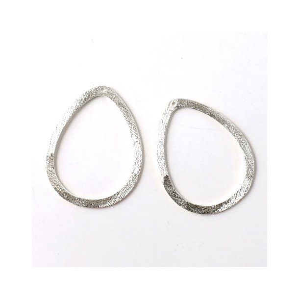 Silver teardrop-shaped outline, brushed, flat with 0,9mm hole at the top, 24x20mm. 2pcs.