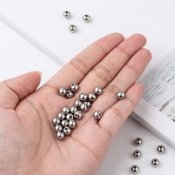 Kugeln, gl&auml;nzender Edelstahl, durchbohrt, 6 mm, Loch 1,5 mm , 2 Stk.