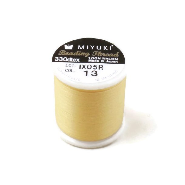 Miyuki beading thread, size B, color code 13, yellow, 50m