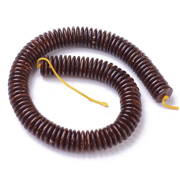 Buttonshaped bead made of polished coconut, full strand, 15x3mm, ca. 110pcs.