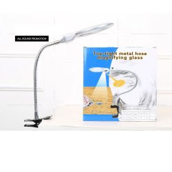 Magnifying glass with a flexible arm, table clamp and LED light.